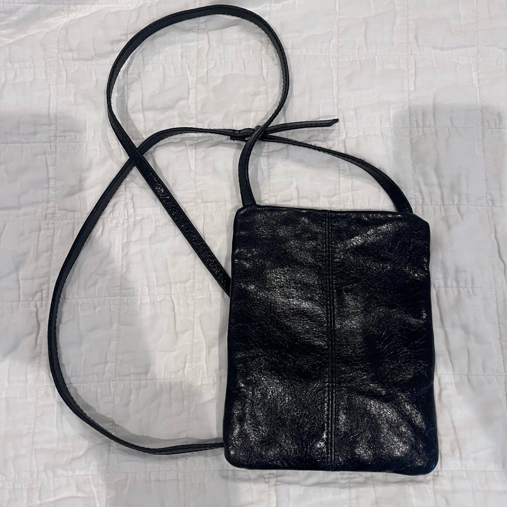 HOBO Black Crossbody Bag with Adjustable Strap and Compact Design